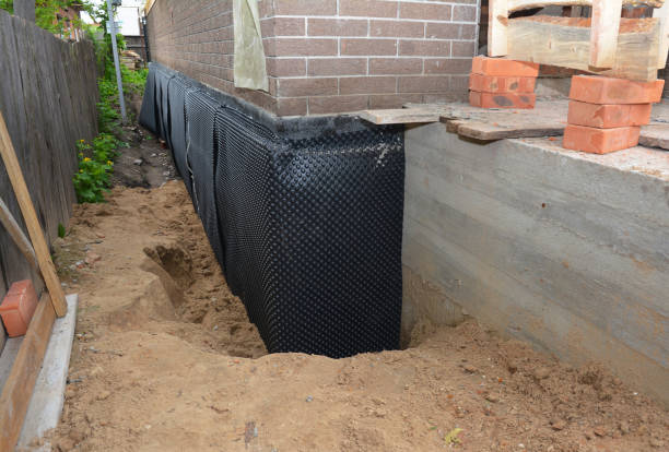 Happy homeowners after waterproofing job in South Amboy